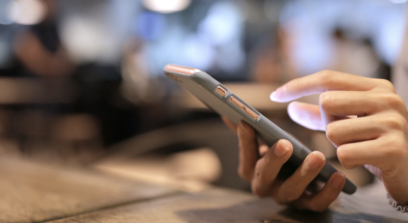 Person looking at his mobile text